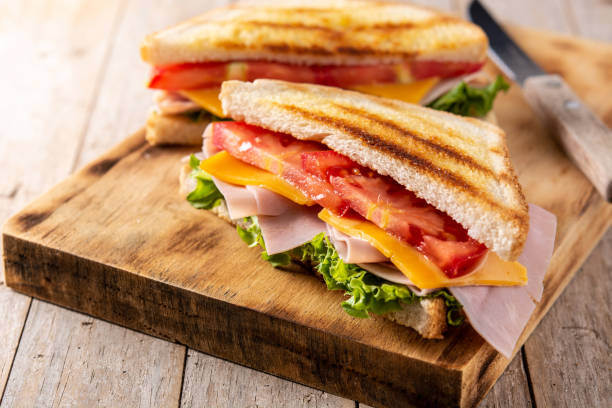 istock Sandwich with tomato,lettuce,ham and cheese 1328484521