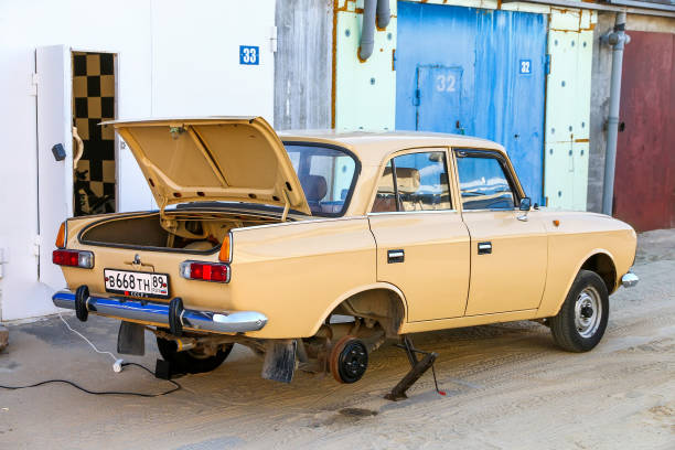 Novyy Urengoy, Russia - June 30, 2021: Soviet retro car Izh Moskvitch 412 near the garage.