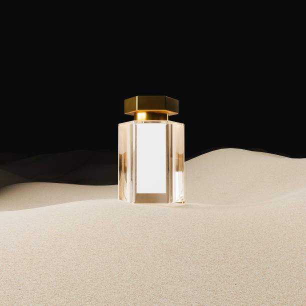 Perfume glass bottle mockup glass fragrance bottle with golden cap and white label on desert sand with dark background. design presentation. cosmetics display. 3d render perfume sprayer stock pictures, royalty-free photos & images
