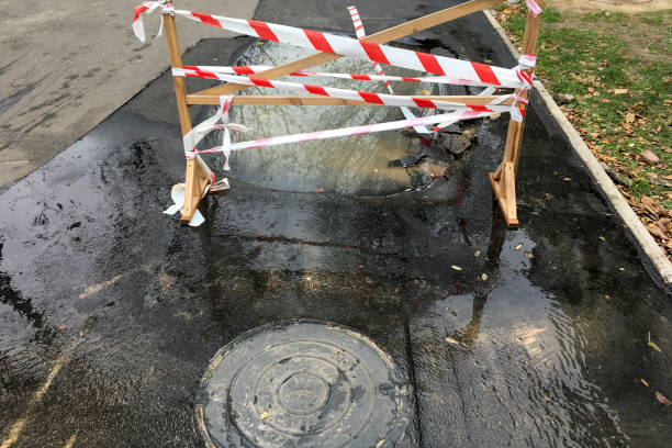 istock Breakthrough communications, water on the asphalt road, fencing 1328491849
