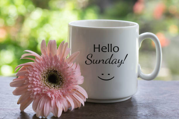 istock Sunday coffee with pink soft flower on the table. 1328492896