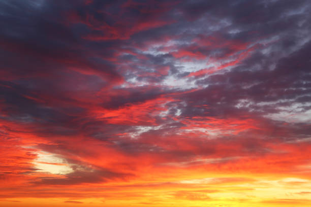 istock Sunset on colorful dramatic sky with red and orange clouds 1328494998