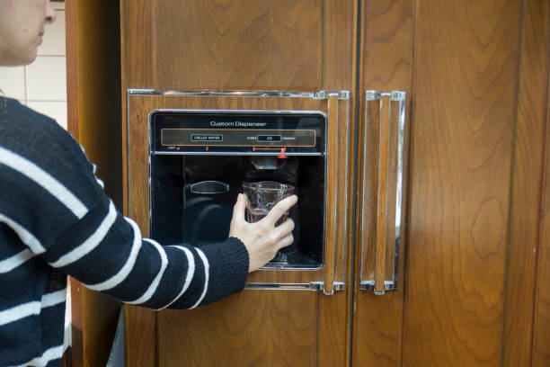 istock cold water from the special unit of the refrigerator. 1328505031