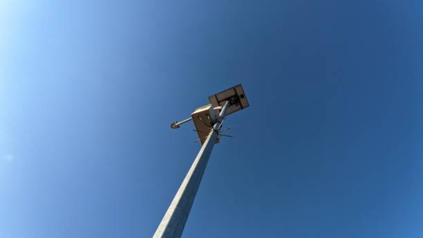 istock Solar lamppost in the middle of the blue sky 1328506300