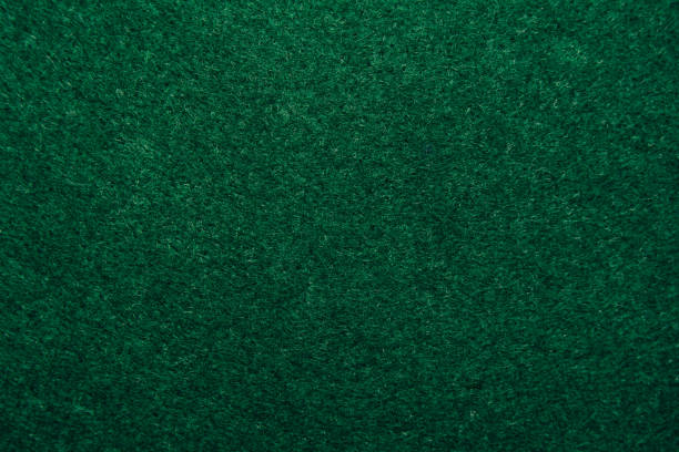 istock A close up of dark green felt material background. 1328510021