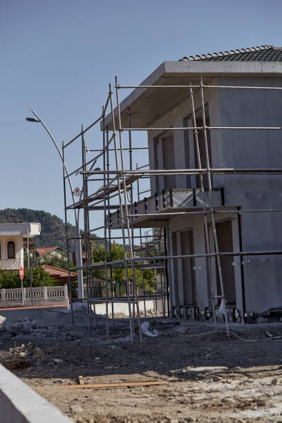 istock Home construction near the mountains on sunny day 1328511944