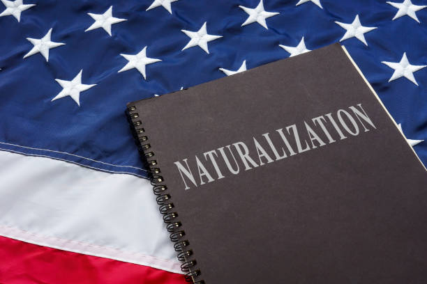 istock Law about naturalization on the American flag. 1328513520