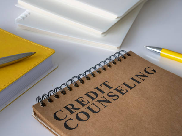 istock Credit counseling notepad on the white desk. 1328513674