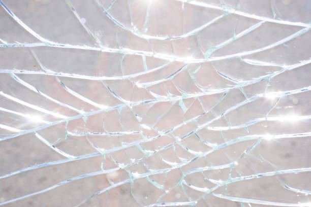 istock Broken glass over natural pale pink background 1328524103