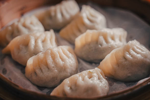 대나무 증기선, 스트리밍 식물만두 중국 음식 - mantou chinese dumpling white chinese culture 뉴스 사진 이미지
