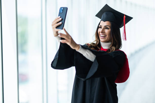 istock Young female woman student graduating from university 1328526869