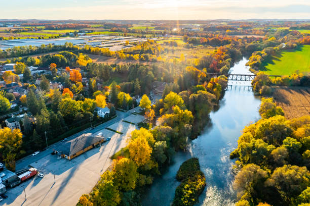 istock Aerial Railway Bridge and Conestogo River at dusk, St. Jacobs, Canada 1328528426