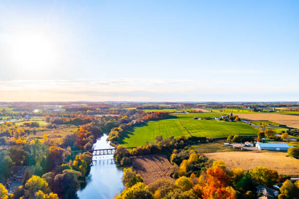 istock Aerial Railway Bridge and Conestogo River at dusk, St. Jacobs, Canada 1328528448