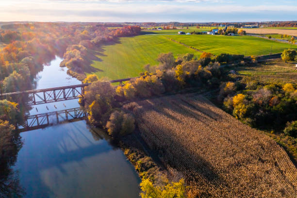 istock Aerial Railway Bridge and Conestogo River at dusk, St. Jacobs, Canada 1328528476