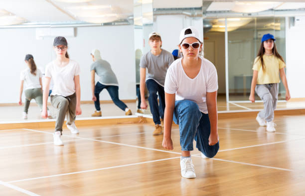 istock Teenagers training hip hop in dance studio 1328531011