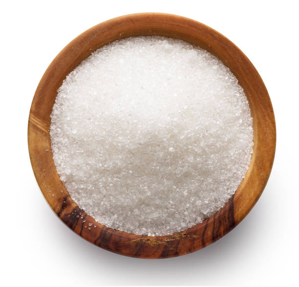 istock White refined sugar in ceramic bowl on white background. Top view. File contains clipping path. 1328532183