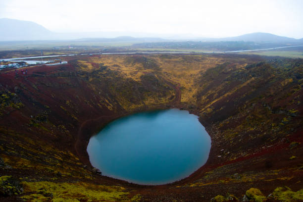 This crater is on Iceland, its name is Kerið.\nThe photo is taken on summer season.
