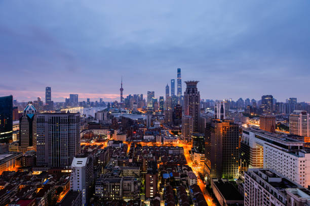 Elevated view of Shanghai skyline at dawn.