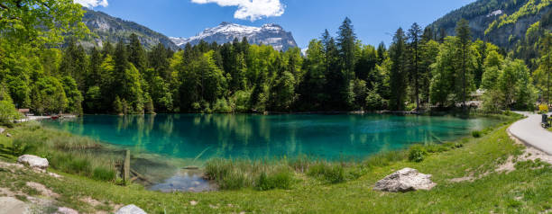 istock Panorama of Blausee-Blue lake in Switzerland 1328545506