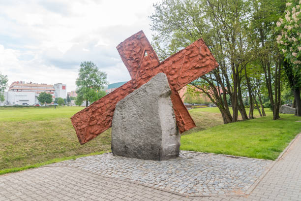 Cross to commemorate Michal Adamowicz from Lubin, who was shot in the back of the head on the nearby bridge. Lubin, Poland - June 1, 2021: Cross to commemorate Michal Adamowicz from Lubin, who was shot in the back of the head on the nearby bridge. solidarity labor union stock pictures, royalty-free photos & images