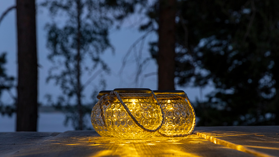 Close-up picture of solar powered garden lights in Finnish twilight
