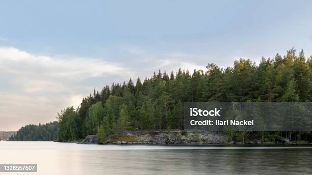 Long Exposure Photo Of Quiet Island On Finnish Lake Päijänne Stock Photo - Download Image Now