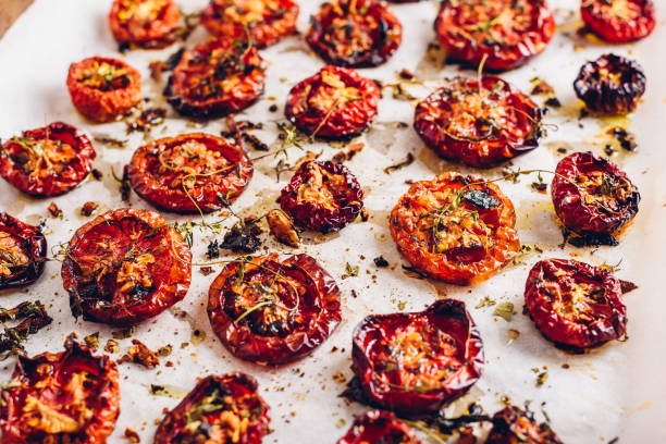istock Cooked Sun Dried Tomatoes with Olive Oil, Garlic and Thyme 1328561577