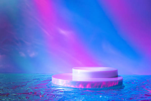 istock empty scene with cylinder podiums on holographic neon colored background 1328565595