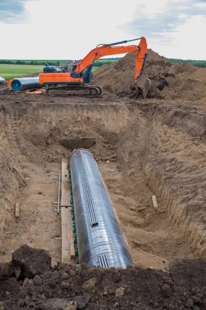Photo of Construction works for laying the pipe.