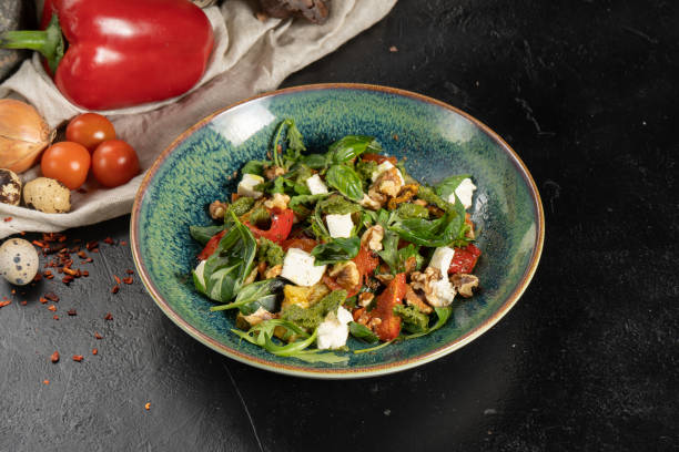 istock Greek salad with walnuts and feta cheese 1328568204