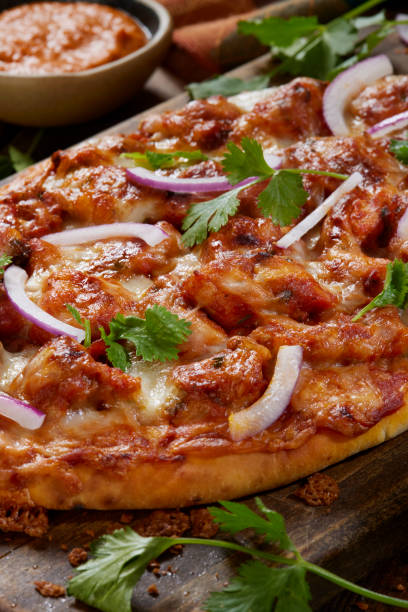istock Butter Chicken Pizza on Naan Bread 1328570494