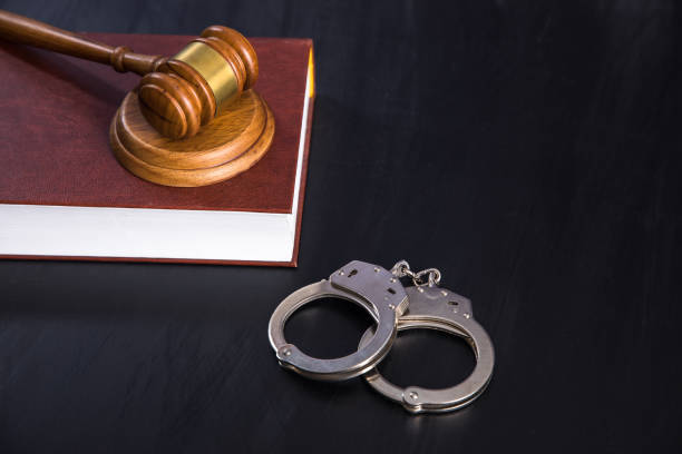istock judge gavel with book and handcuffs 1328572565