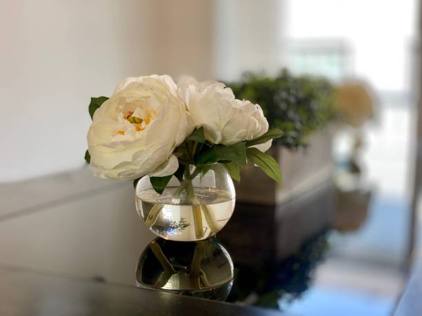 istock Table flower staging home design vase 1328576492