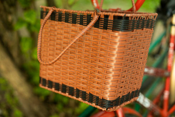 istock Wicker basket on a bicycle. A basket for transporting products. 1328577212