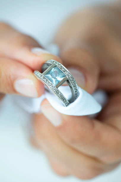 istock Jeweller Polishing Ring 1328580300