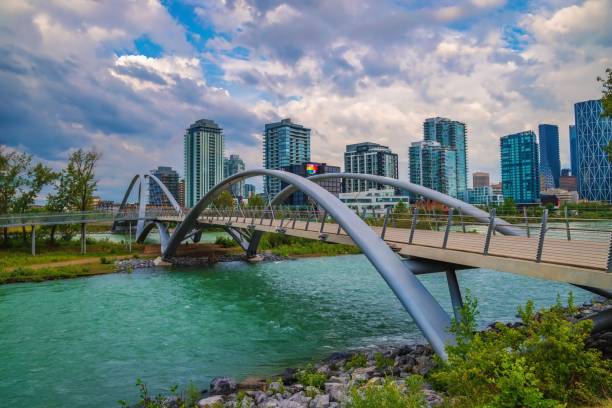 istock Clouds Over A City Bridge Crossing The Bow River 1328580497