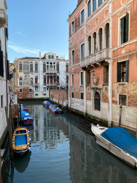 istock Gondola ride in Venice in a golden hour light 1328581931