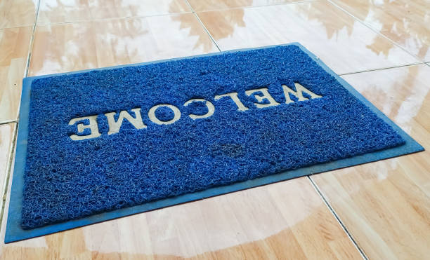 istock foot wipes that say welcome 1328585755