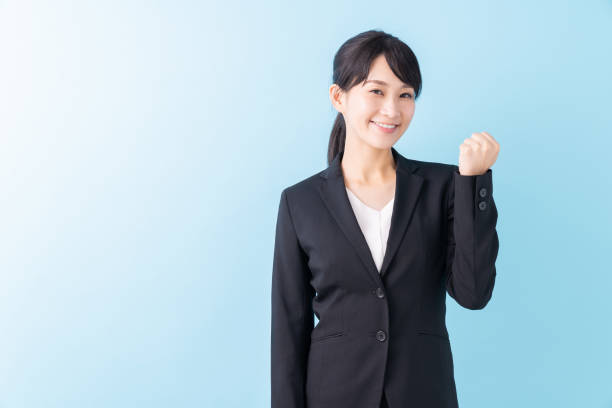 istock young attractive asian businesswoman 1328593363