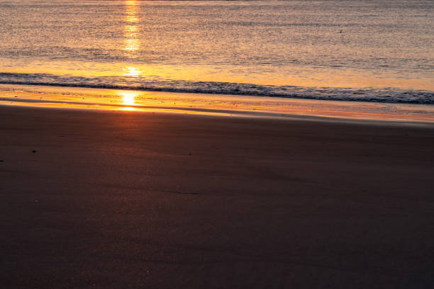 istock Golden Sunrise Over Ocean 1328594879