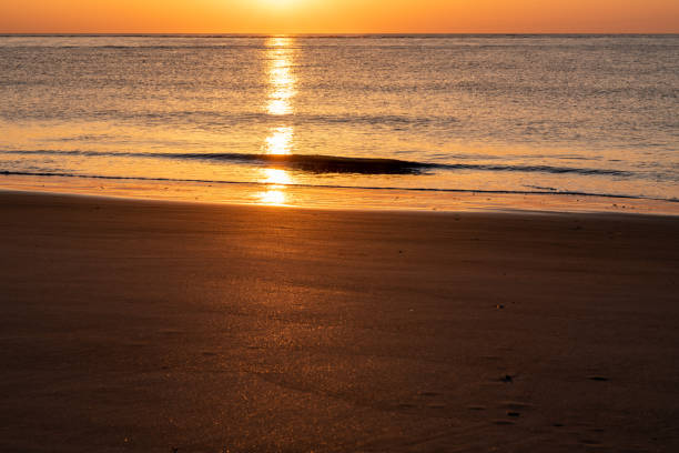 istock Golden Sunrise Over Ocean 1328594900