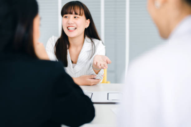 istock Business asian team discussion work in office,People sharing ideas and discussing project,Brainstorm meeting concept 1328596467