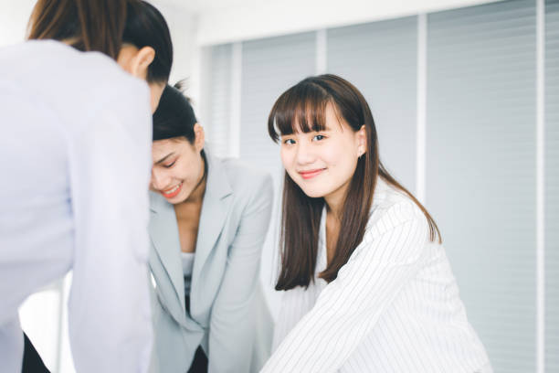 istock Business asian team discussion work in office,People sharing ideas and discussing project,Brainstorm meeting concept 1328596471