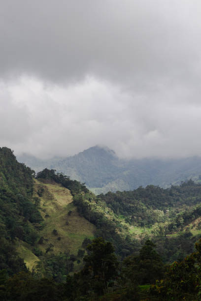 istock sunbeam illuminating the mountains on a cloudy day 1328597190
