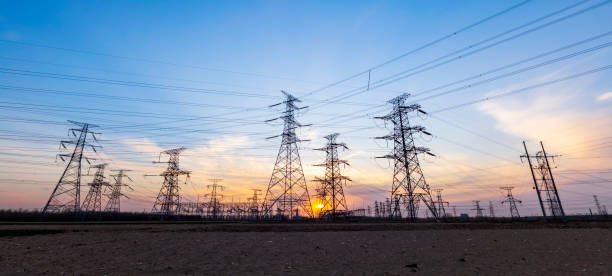 istock Pylons, high voltage pylons in the evening 1328599617