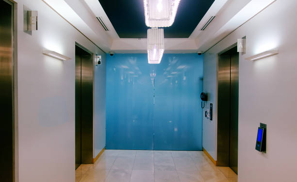 istock Modern elevator lobby in business building 1328602381