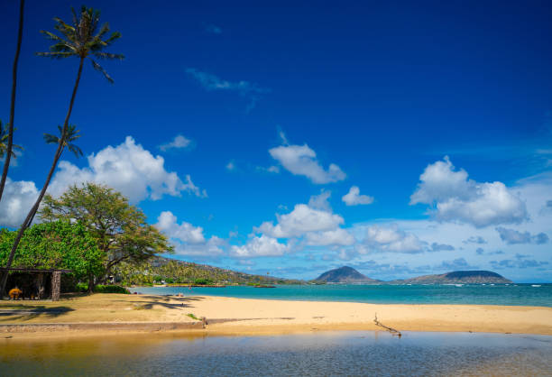 Walking on an empty Kahala Beach in Oahu, Hawaii