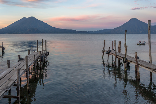 Spectacular landscape of sunrise at the docks of Panajachel at Lake Atitlán, in the Guatemalan highlands, Central America