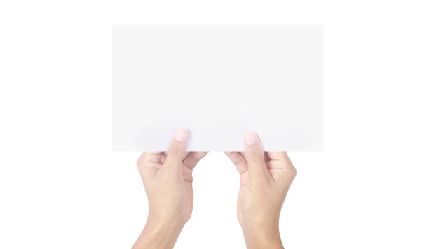 istock Hands holding paper blank for letter paper 1328608983