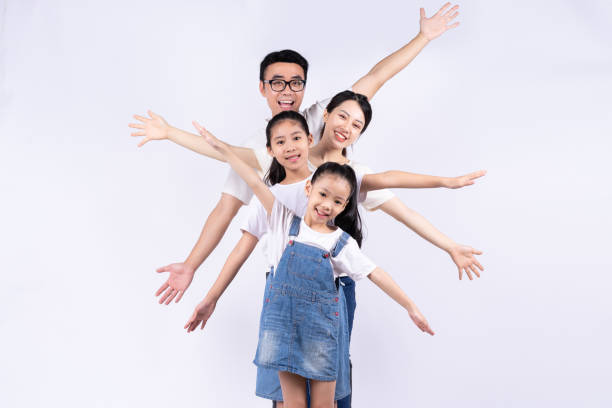 Portrait of Asian family on white background